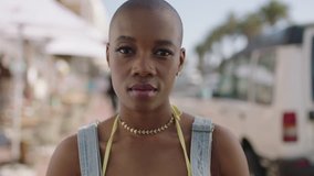 portrait of of beautiful african american woman looking serious on sunny beachfront thinking pensive - Powered by Shutterstock - Get 15% off with code: PIKWIZARD15