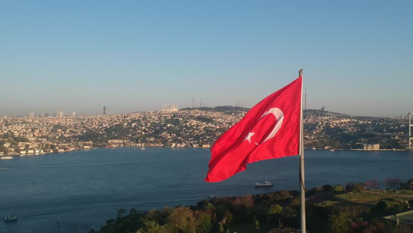 Turkish Flag Aerial View  - Waving - Drone Shot On Bosporus  Royalty-Free Stock Footage #1010715356