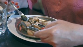 
Professional video of eating snails in restaurant in 4K Slow motion 60fps

