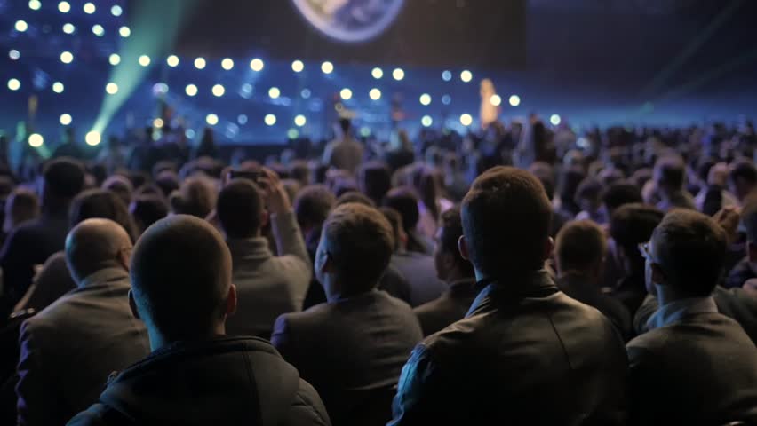 Audience applauded by the stage artist. Cincert lot people crowd