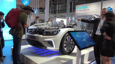 Hannover, Germany - April, 2018: Digital Enterprise in the automotive industry, Volkswagen Tiguan prototype on Siemens stand on Messe fair in Hannover, Germany