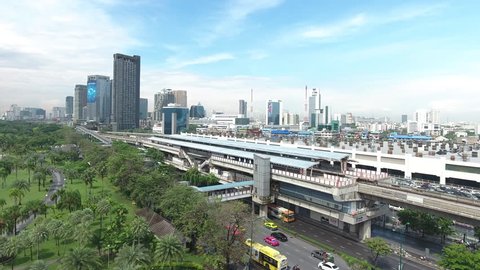 Aerial video,Drone shot bangkok, electric train and city, bangkok bts, Chatuchak park