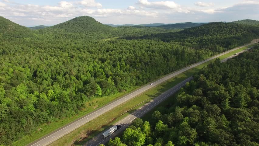 4K aerial of an interstate highway in the Adirondacks mountains, upstate New York, USA