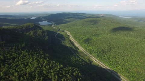 4K aerial of an interstate highway in the Adirondacks mountains, upstate New York, USA