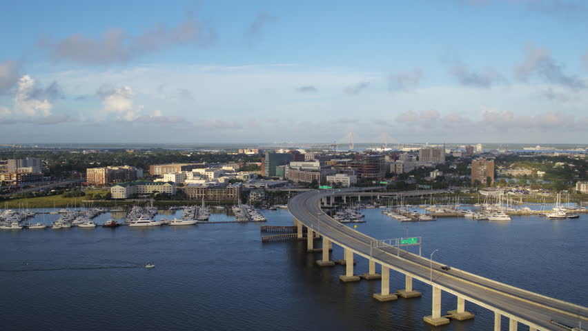 South Carolina Charleston Aerial v121 Panning high to low around marina with cityscape view 10/17
