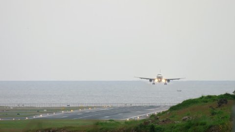 Airplane approaching before landing at Phuket airport at early morning