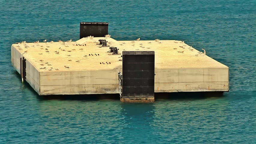 the seagulls stop / a flock of flying seagulls take off and land from a quay  in the mida quay in the middle of the sea flying dle of the sea