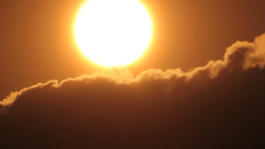 Sun moves down of sky and hides in darkness of density clouds | Shutterstock HD Video #1010799005