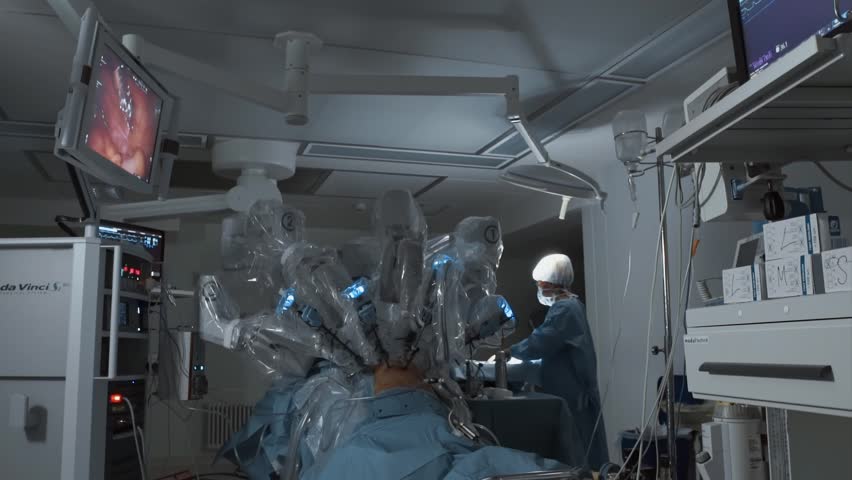 Operating room, futuristic medical surgical robot, cancerous tumor removal surgery. Modern medical equipment, robotic arms. Minimally Invasive Robotic Surgery. Modern medicine  Royalty-Free Stock Footage #1010807741