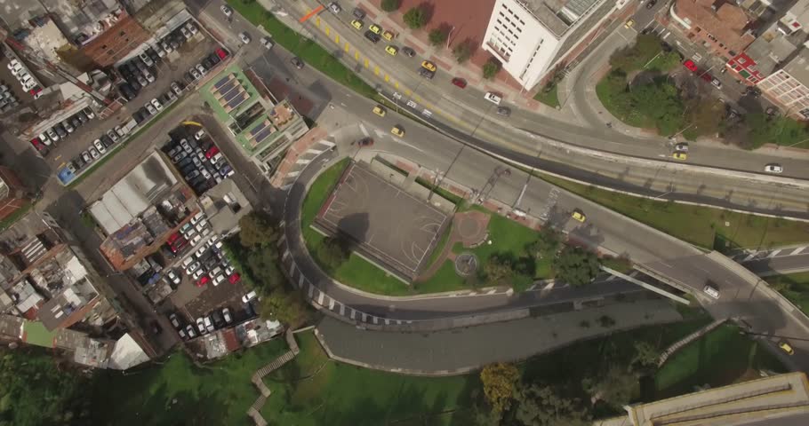 Top down aerial of downtown Bogota traffic and office buildings