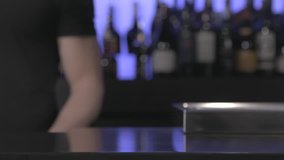 Bartender Serves a Delicious Drink 
