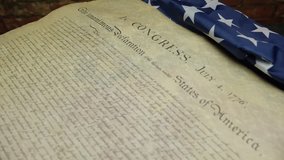 Spinning declaration of independence - Powered by Shutterstock - Get 15% off with code: PIKWIZARD15