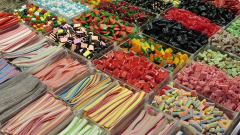 Assorted colorful jelly candies on display at a local food market