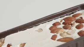 Slow pan on halva with pistachio and peanuts 4K video