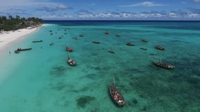 Tipical boat from a Drone in Zanzibar Ocean Indian.  Aerial videos in Zanzibar Tanzanzia AFRICA.