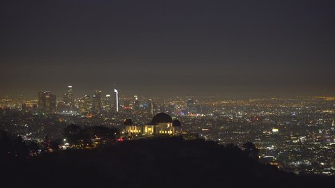 Griffith Observatory building and Los Angeles lights at night - August 2017: Los Angeles California, US
