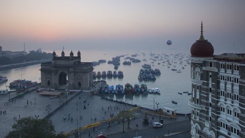 Jan 2018, India, Mumbai, Maharashtra, The Gateway of India, monument commemorating the landing of King George V and Queen Mary in 1911 - night to day time lapse