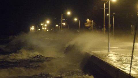 Huge Waves Crash Over Sea Wall During Storm