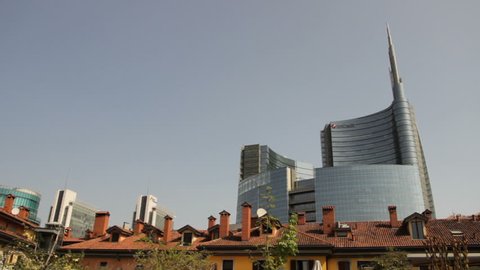 Milan,Italy-May 2018: Man under Skyscraper of Piazza Gae Aulenti Square Porta Nuova District