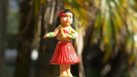 Professional video of traditional hula dancer souvenir toy in 4K slow motion 60fps