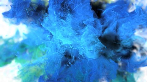 Color Burst - colorful blue cyan yellow smoke explosion fluid gas ink particles slow motion alpha matte isolated on white macro close-up