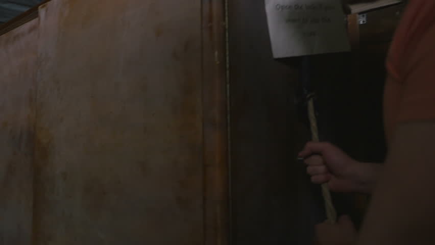Team of friends finding a key in escape room game