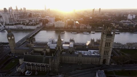4K Aerial View London UK Parliament Palace Government Building British Famous International Landmark Architecture Clock Tower Big Ben in Westminster, England with Iconic Skyscrapers, Wheel at Sunrise
