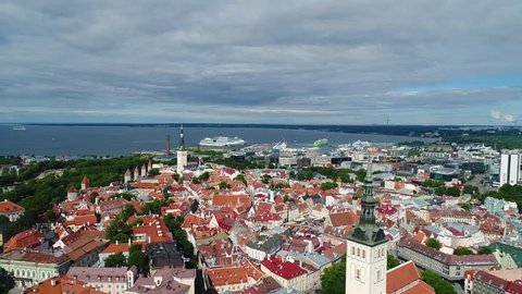 Aerial view of a drone slowly flying over Tallinn old town on sunny summer day. Tallinn, Estonia.