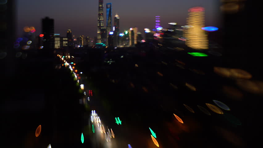Blurred dramatic night view of Shanghai  city with  beautiful bokeh,shot by tilt and shit lens