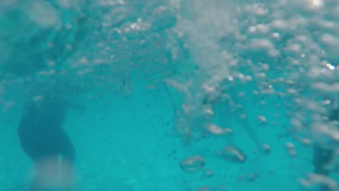 Underwater view of people in the pool water Great Stirrup Cay (Berry Islands) August 2017 Caribbean 