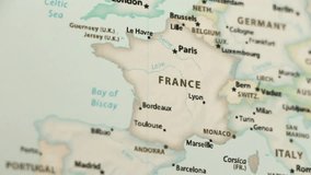 France on a political map of the world. Video defocuses showing and hiding the map.