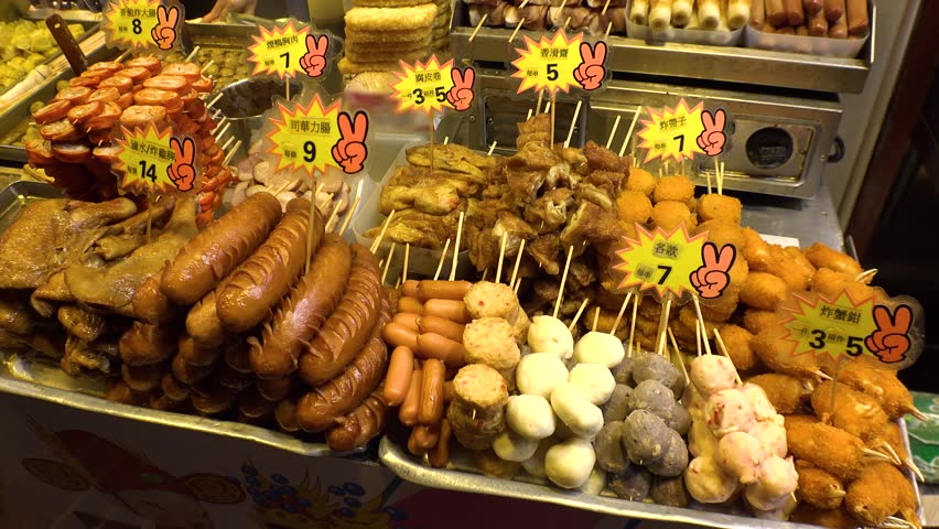 HONG KONG - CIRCA APRIL 2018 : Various STREET SNACK FOOD on stick at street food shop.