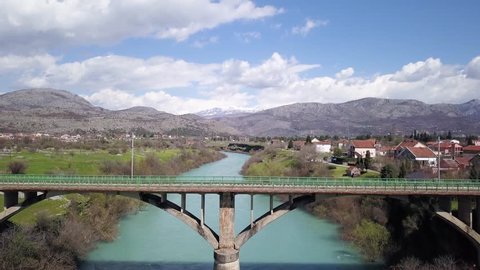 Collide of Two rivers, delta, river flow, two different colors, Moraca and Zeta, Rail Way bridge