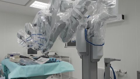 Operating room, medical surgical robot, cancerous tumor removal surgery. Modern medical equipment. Minimally Invasive Robotic Surgery with the Da Vinci Surgical System