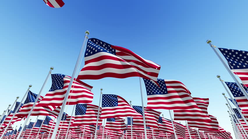 Many American USA Flags fluttering in the wind on flag poles against blue sky. Three dimensional rendering animation. Royalty-Free Stock Footage #1010971814