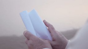 High quality video of paper with the message in hands in real 1080p slow motion 250fps
