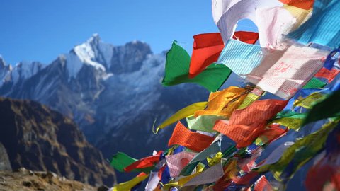 Buddhist prayer flags in the Himalaya mountains, Annapurna base camp, Nepal, Asia.