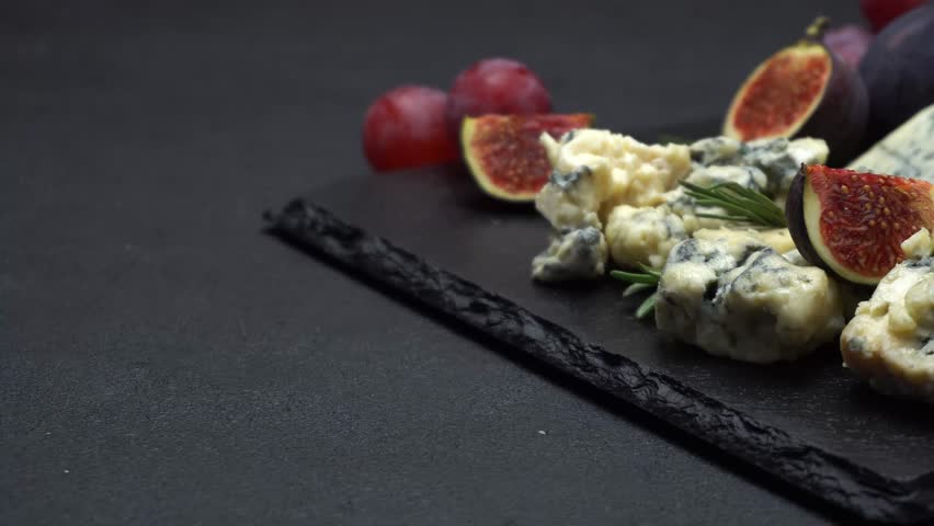 Video of roquefort or dorblu cheese and fig | Shutterstock HD Video #1010999624