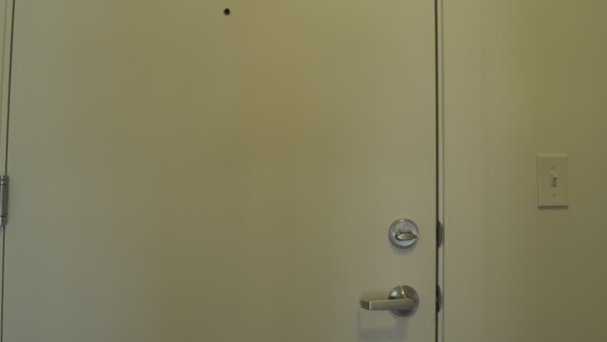 Medium shot of a couple moving in a new apartment