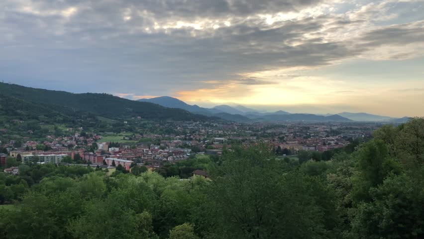 View on Bergamo at sunset, Lombardy, Italy.Bergamo is an Italian city northeast of Milan, in the Lombardy region. Its older upper district, called Citta Alta, is characterized by cobblestone streets.