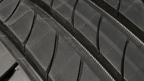 Unused tread pattern on tire surface 4K panning footage