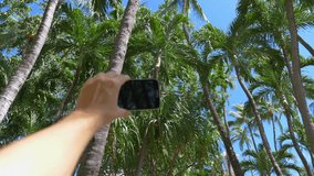 Professional video series of POV taking a selfie photo in rainforest jungle in 4K Slow motion 60fps
