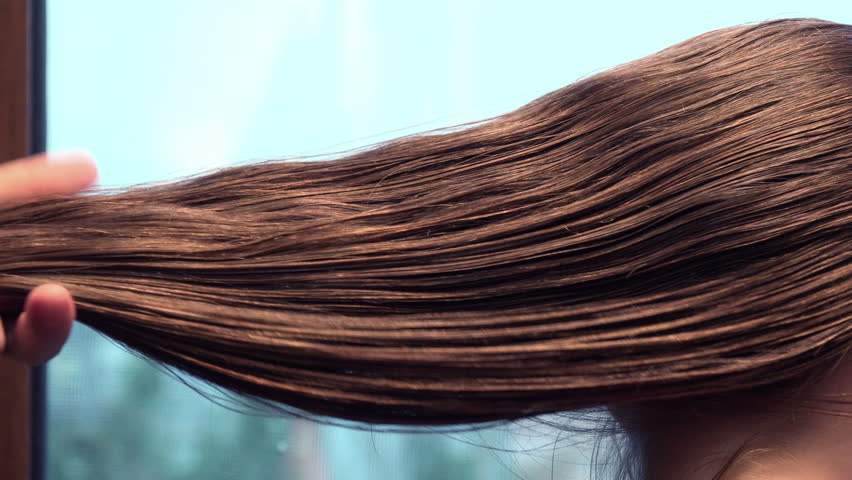 Combing long Hair, close up Royalty-Free Stock Footage #1011030095