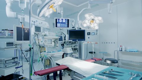Establishing Shot of Technologically Advanced Operating Room with No People, Ready for Surgery. Real Modern Operating TheaterWith Working Equipment. 