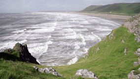 HD video of waves at Rhossili beach, Pembrokeshire, wales, on a windy day
