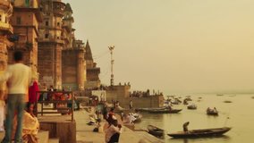 Time lapse Indian pilgrims rowing boat in sunrise, Ganges river at Varanasi, India. 4k footage video.