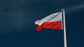 Polish flag waving in the wind.