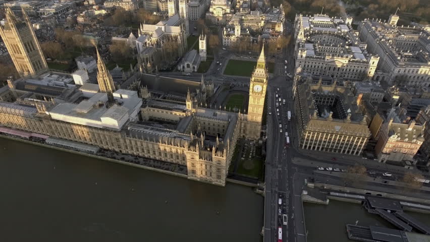 4K London Bird View of Houses of Parliament, Big Ben, Palace of Westminster and Gothic Historical Landmarks Buildings from Up High at Sunset in England, United Kingdom UK