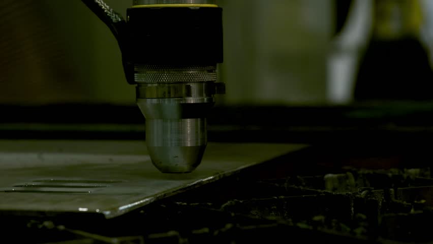 Industrial robotic laser cutter cuts metal parts with great precision just like a knife through butter. | Shutterstock HD Video #1011096326