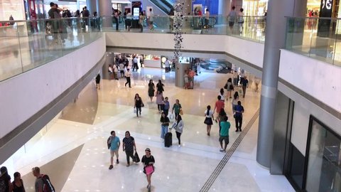 HONG KONG - SEPTEMBER 2017: People walk in One International Finance Centre. IFC Mall is a 4 storey shopping mall, with many luxury retail brands and wide variety of restaurants.